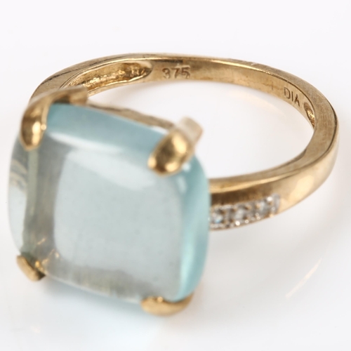 149 - A 9ct good aquamarine and diamond dress ring, set with rectangular cabochon aqua and single-cut diam... 