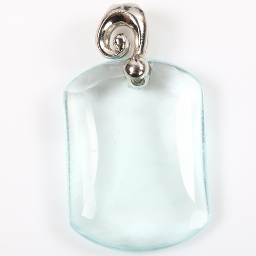 150 - A silver aquamarine tablet pendant, with faceted edges, pendant height 33.3mm, 5.1g