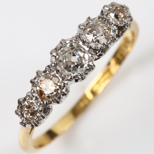 153 - An 18ct gold graduated five stone diamond ring, platinum-topped set with old-cut diamonds, total dia... 