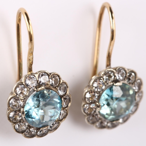 155 - A pair of blue zircon and white sapphire cluster earrings, unmarked gold settings with shepherd hook... 