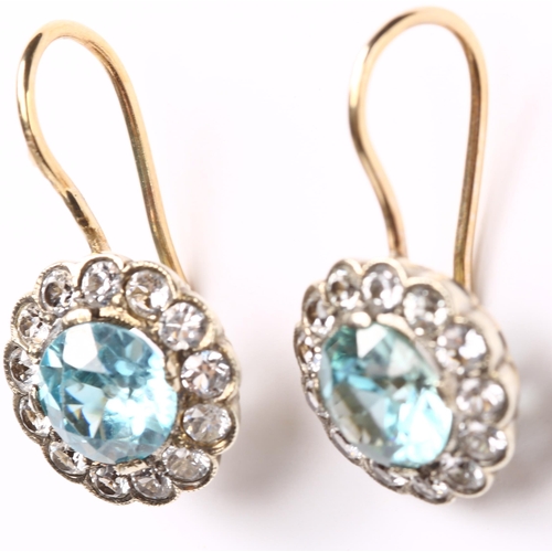 155 - A pair of blue zircon and white sapphire cluster earrings, unmarked gold settings with shepherd hook... 