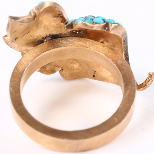 157 - A large turquoise leaf ring, unmarked rose metal settings, setting height 21.3mm, 10.4g