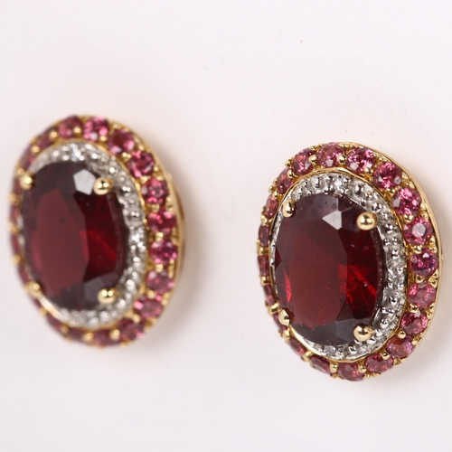 162 - A pair of 9ct gold garnet pink tourmaline and diamond cluster earrings, with stud fittings, earring ... 