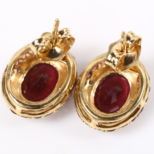 162 - A pair of 9ct gold garnet pink tourmaline and diamond cluster earrings, with stud fittings, earring ... 