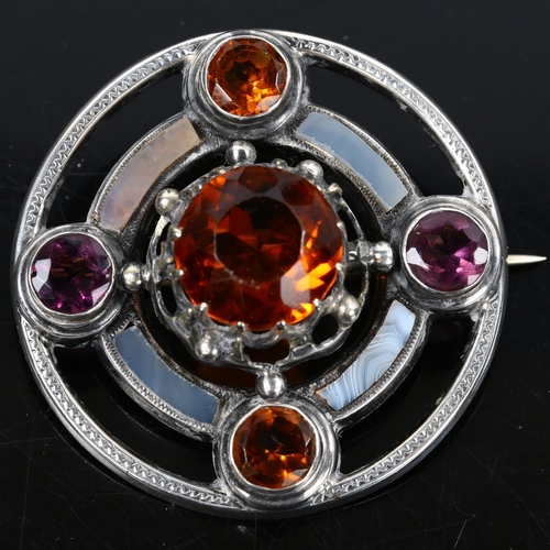 167 - A Scottish unmarked silver stone set Targe shield target brooch, set with citrine amethyst and bande... 