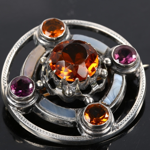 167 - A Scottish unmarked silver stone set Targe shield target brooch, set with citrine amethyst and bande... 