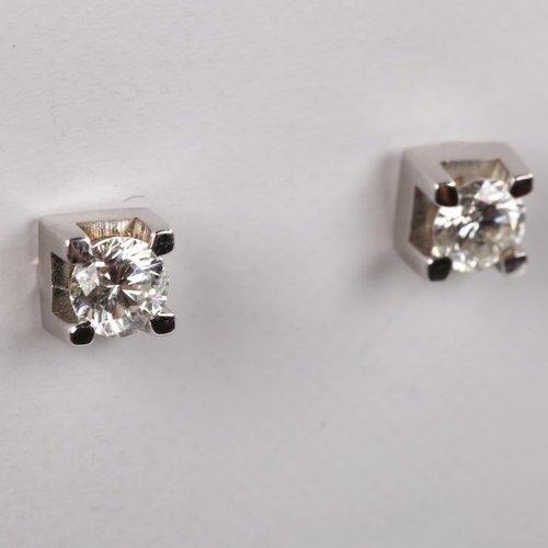 171 - A pair of 18ct white gold 0.5ct solitaire diamond earrings, prong set with modern round brilliant-cu... 