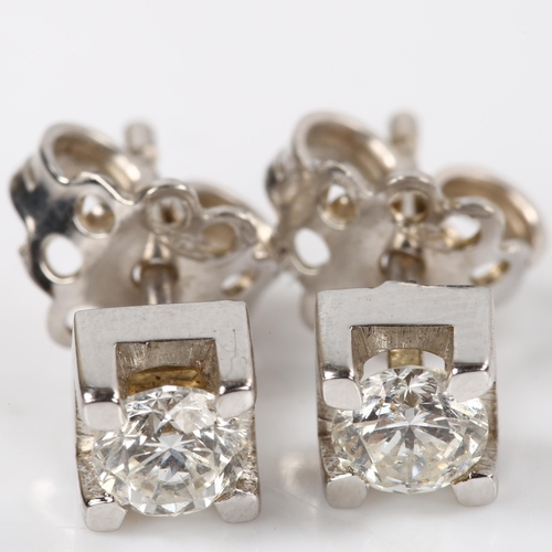 171 - A pair of 18ct white gold 0.5ct solitaire diamond earrings, prong set with modern round brilliant-cu... 