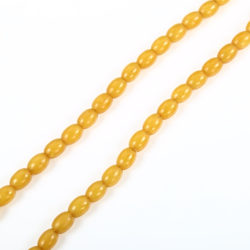 182 - A single-strand pale amber bead necklace, bead lengths 9.5mm, necklace length 42cm, 17.1g