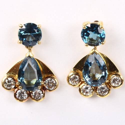 183 - A pair of Art Deco style 18ct gold blue topaz and diamond fan drop earrings, total diamond content a... 