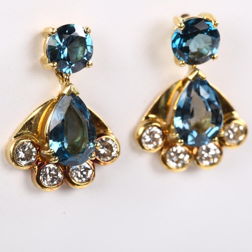 183 - A pair of Art Deco style 18ct gold blue topaz and diamond fan drop earrings, total diamond content a... 