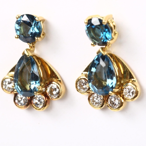 183 - A pair of Art Deco style 18ct gold blue topaz and diamond fan drop earrings, total diamond content a... 