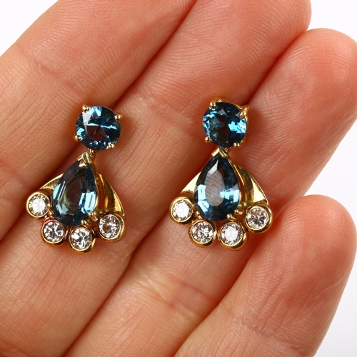 183 - A pair of Art Deco style 18ct gold blue topaz and diamond fan drop earrings, total diamond content a... 