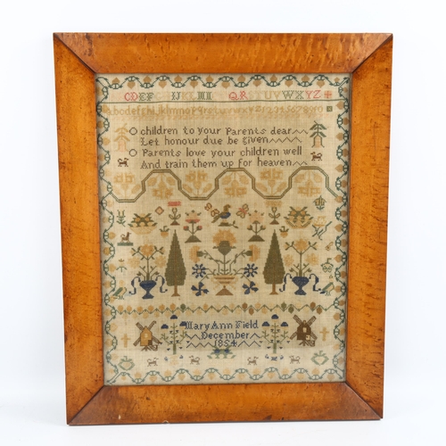 1062 - Mid-19th century needlework sampler, by Mary Ann Field, dated December 1854, original maple frame, o... 