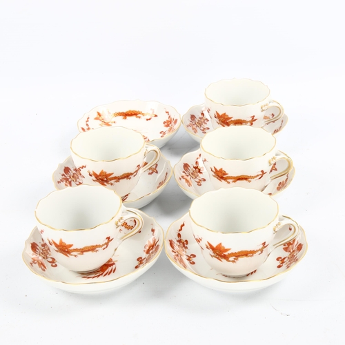 1065 - A set of 5 Meissen white glaze porcelain coffee cups and saucers, with red and gilt dragon designs