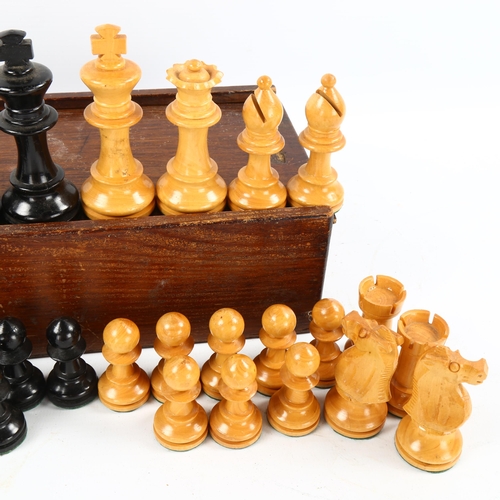 1072 - A boxwood and ebonised Staunton pattern chess set, King height 8.5cm, in wooden games box