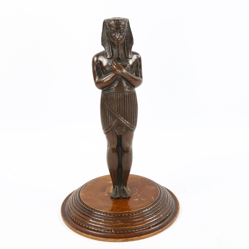 1073 - 19th century patinated bronze Egyptian Revival figure, unsigned, on carved and turned wood base, hei... 