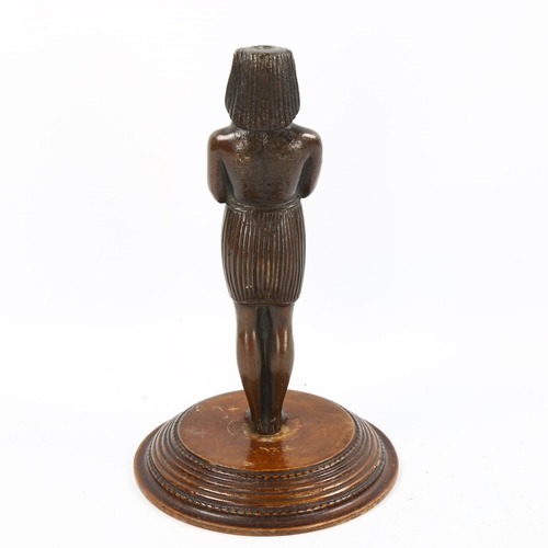 1073 - 19th century patinated bronze Egyptian Revival figure, unsigned, on carved and turned wood base, hei... 