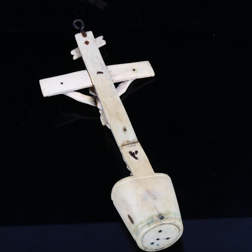 1075 - An 18th century carved bone crucifix, length 22cm