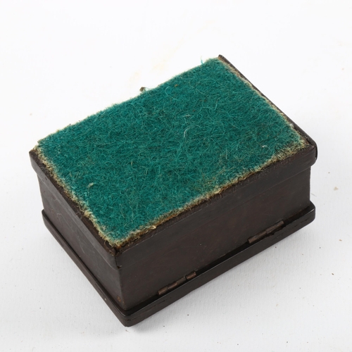 1076 - 19th century ebony matchbox with Pietra Dura hardstone inlaid match design lid, length 7cm