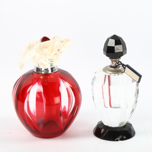 1089 - Lynley's black and clear glass perfume bottle, height 10cm, and Cartier red flash glass perfume bott... 