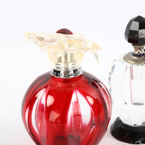 1089 - Lynley's black and clear glass perfume bottle, height 10cm, and Cartier red flash glass perfume bott... 