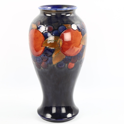 1092 - Large Moorcroft pottery Pomegranates and Grape pattern vase, height 30cm, base drilled