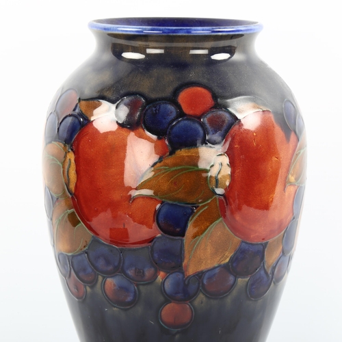 1092 - Large Moorcroft pottery Pomegranates and Grape pattern vase, height 30cm, base drilled