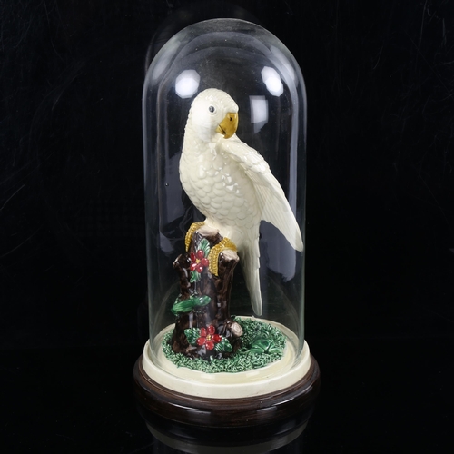 1126 - Bassano Italian pottery parrot under glass dome, dome height 37cm