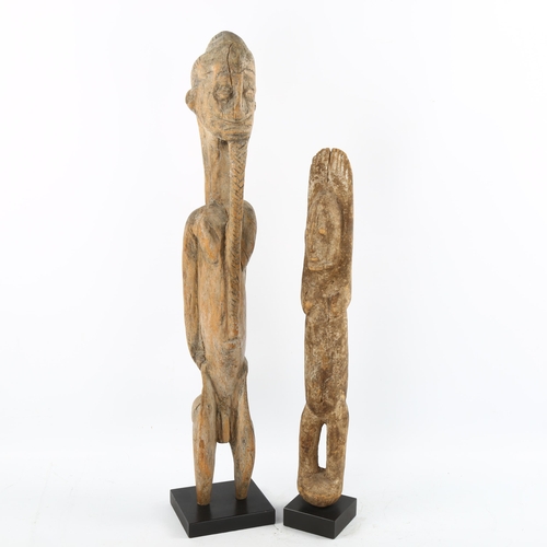 1139 - 2 African Dogon Tribal carved wood fertility figures, largest height 63cm (2)