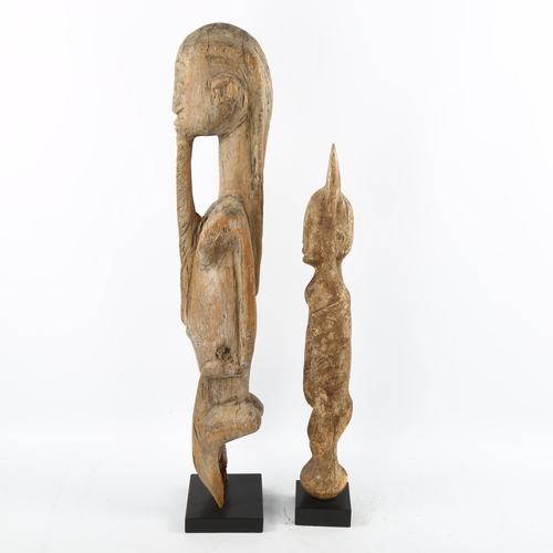 1139 - 2 African Dogon Tribal carved wood fertility figures, largest height 63cm (2)