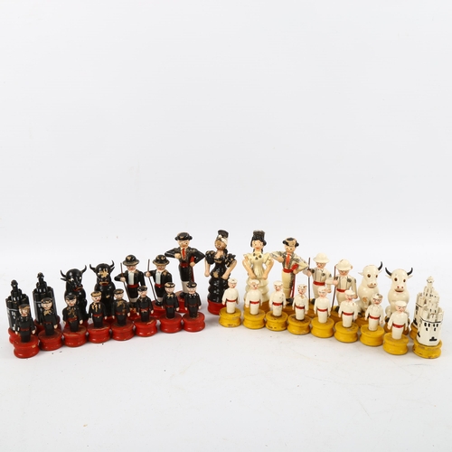 1165 - A carved and painted wood chess set, circa 1930s, King height 9cm