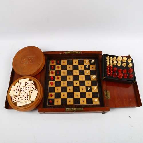 1166 - A 19th century travelling chess board, boxwood and ebony, with part chess set, together with a 19th ... 