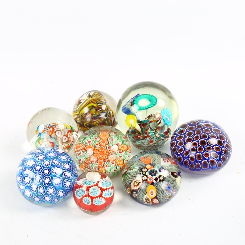 1168 - A group of Millefiori glass paperweights, largest height 9cm