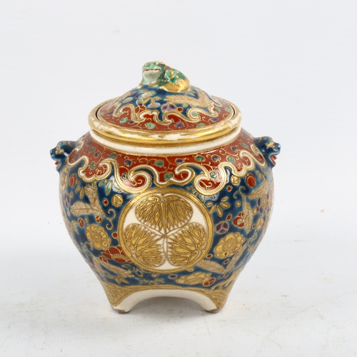 1196 - A Japanese Satsuma porcelain pot pourri pot and cover, brightly coloured painted and gilded decorati... 