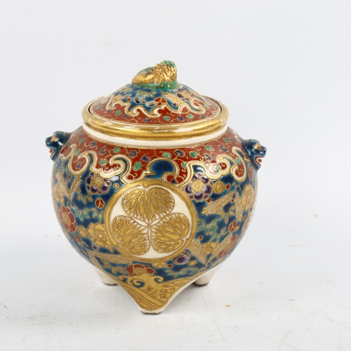 1196 - A Japanese Satsuma porcelain pot pourri pot and cover, brightly coloured painted and gilded decorati... 