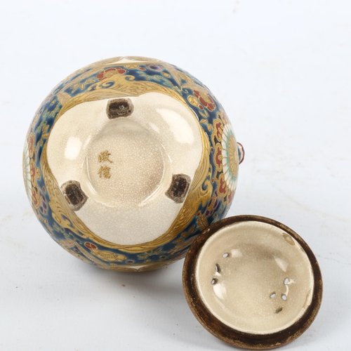 1196 - A Japanese Satsuma porcelain pot pourri pot and cover, brightly coloured painted and gilded decorati... 