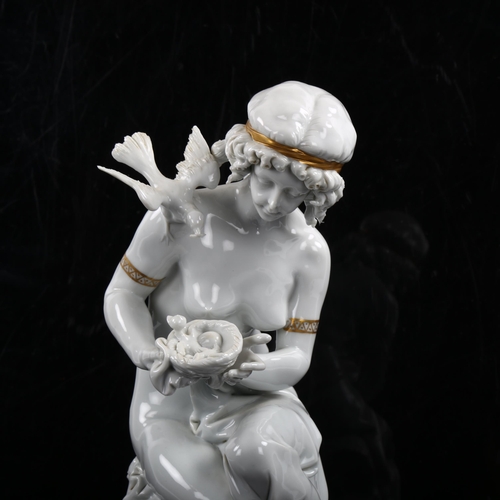 1213 - Capodimonte white glaze Classical figure with a bird, with parcel gilding, height 27cm