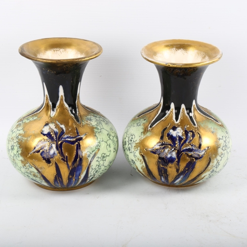 1218 - A pair of Austrian Art Nouveau gilded porcelain lily design vases, factory marks R St K, height 16cm