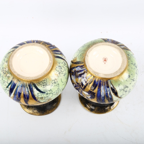 1218 - A pair of Austrian Art Nouveau gilded porcelain lily design vases, factory marks R St K, height 16cm