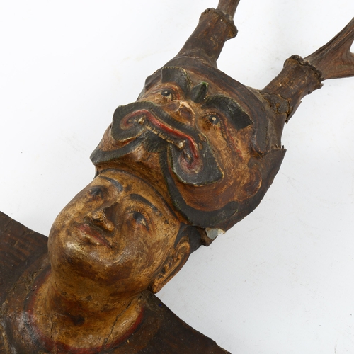 1222 - A Burmese/Indian wood and plaster wall mask with antlers, length 53cm