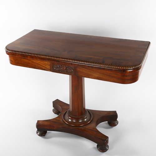 1231 - 19th century Gillows style Goncalo Alves fold over card table, on shaped platform base, length 91cm