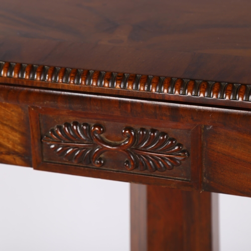 1231 - 19th century Gillows style Goncalo Alves fold over card table, on shaped platform base, length 91cm