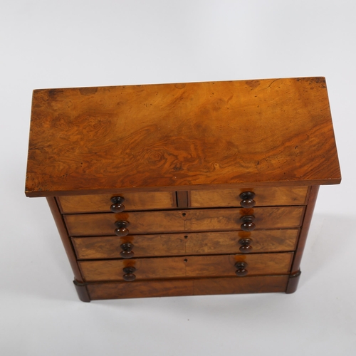 1238 - A Victorian miniature walnut chest of drawers, width 43cm, depth 18cm, height 42cm