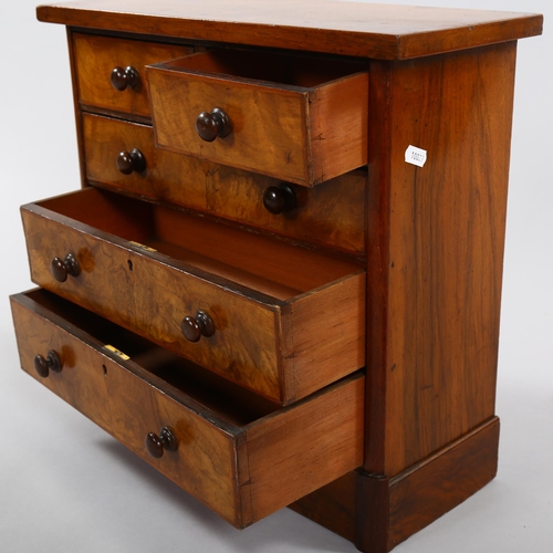 1238 - A Victorian miniature walnut chest of drawers, width 43cm, depth 18cm, height 42cm