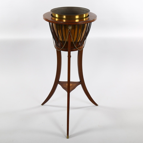 1240 - An Edwardian mahogany jardiniere with brass liner, diameter 40cm