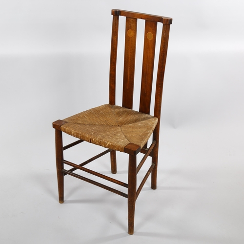 1244 - A Liberty style Art Nouveau beech sided chair, with inlaid back and rush seat, overall height 85cm