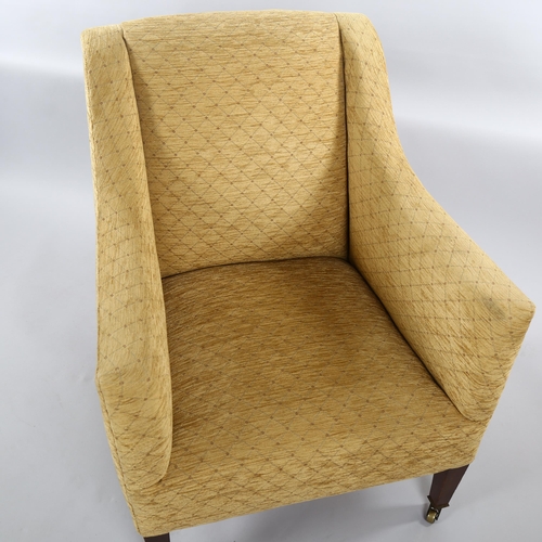 1245 - Howard & Son upholstered armchair, on tapered legs with brass casters, stamped on back leg serial no... 