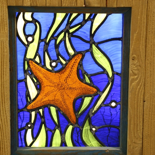 1264 - Paul Sedgwick - illuminated stained glass panel in striped wood frame, 58 x 44cm