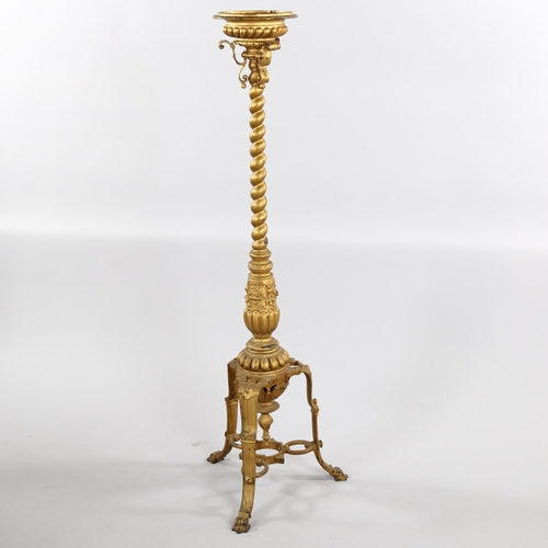 1268 - A 19th century cast bronze torcher stand, with spiral twist centre column and tripod base, height 12... 